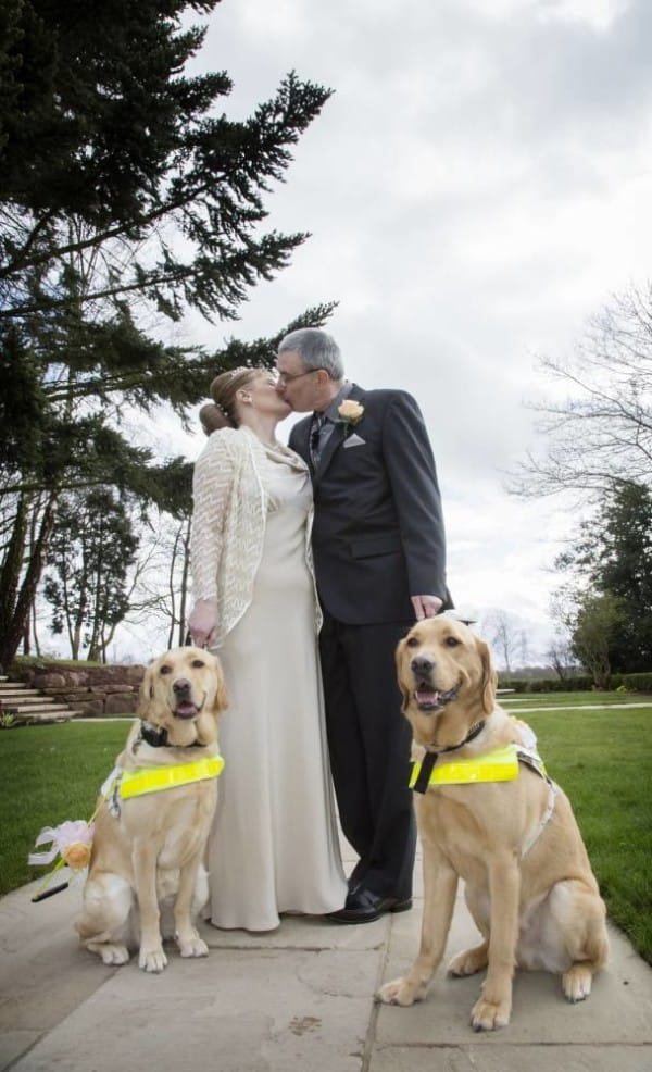 Undated handout photo issued by The Guide Dogs for the Blind Association (Guide Dogs) of guide dog owners Claire Johnson, 50 and Mark Gaffey, 51, who got married in Baralston, Stoke-on-Trent, after their dogs fell in love at training two years ago, their guide dogs, Venice (left) and Rodd, took the happy couple through the service and even acted as ring-bearers. PRESS ASSOCIATION Photo. Issue date: Sunday March 23, 2014. See PA story SOCIAL Dogs. Photo credit should read: The Guide Dogs for the Blind Association/PA Wire NOTE TO EDITORS: This handout photo may only be used in for editorial reporting purposes for the contemporaneous illustration of events, things or the people in the image or facts mentioned in the caption. Reuse of the picture may require further permission from the copyright holder.