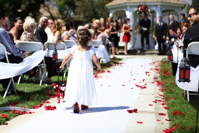 Flower-girl-walking-down-the-aisle